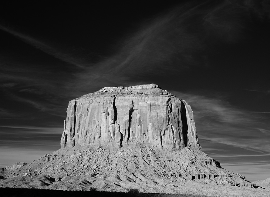 Dramatic Infrared Photo of a Butte in a Western U.S. Landscape.